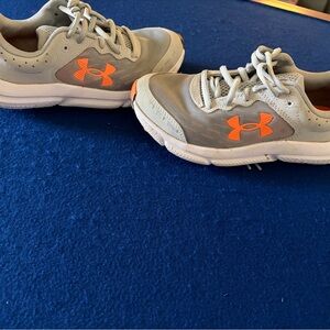 Under Armour Kids Gray Sneakers with Bright Orange Logo Accent